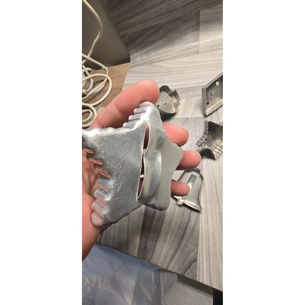 Set Of 8 vintage aluminum cookie cutters